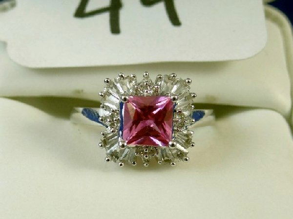 3+CT Pink & Diamond Solid 10K Gold Ring: Gorgeous 3+CT Pink & Diamond Solid 10K Gold Ring. This fantastic piece has an approx. 1.5CT genuine pink sapphire, princess-cut center stone & is surrounded by approx. 1.5CTTW shimmering white diamond