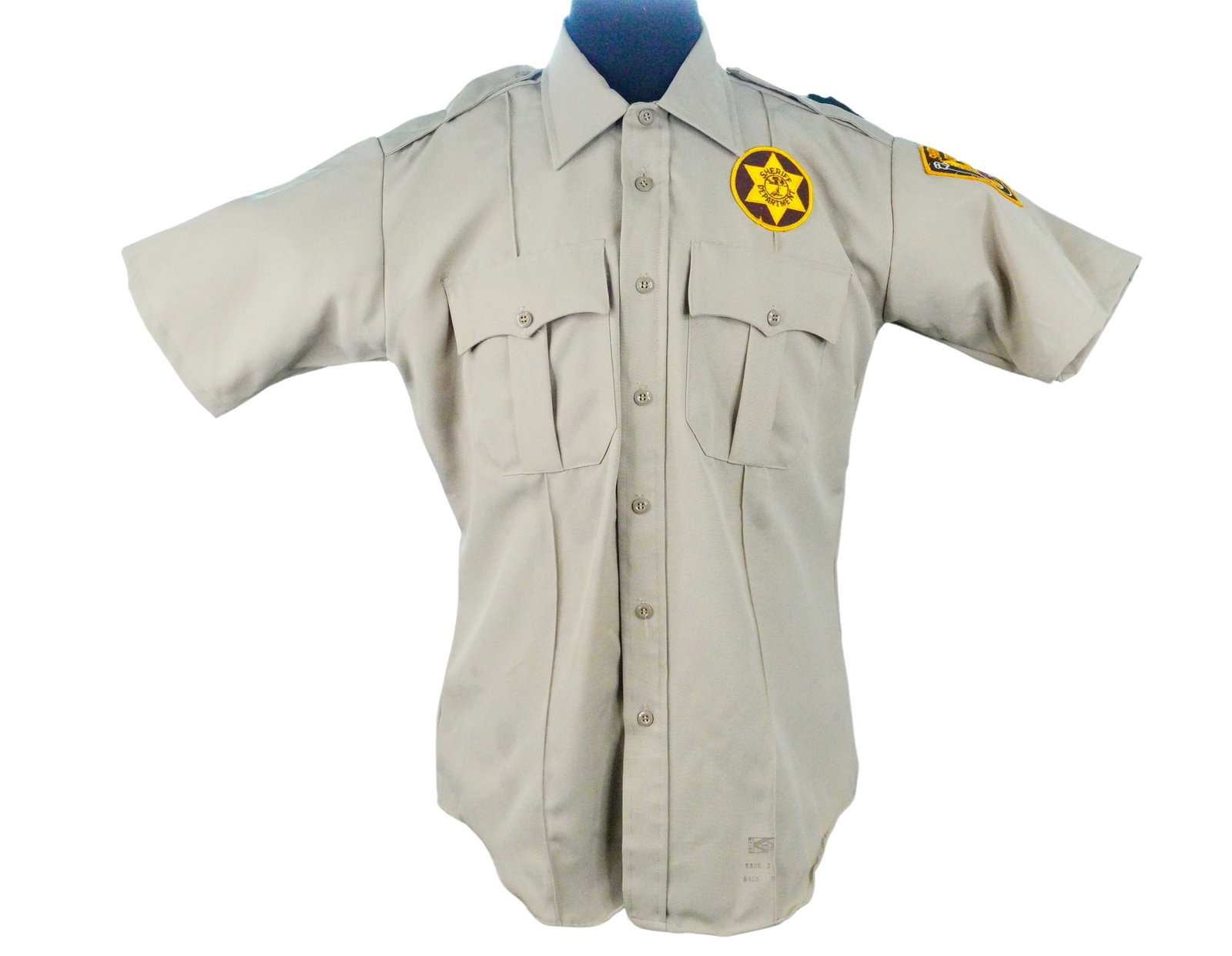 Dallas (1978-1991) Sheriff Shirt Worn By Ken Kercheval: Dallas (1978-1991) Sheriff Shirt Worn By Ken Kercheval W/COA - This sheriff's department shirt is part of the costume worn by actor Ken Kercheval for his role as Cliff Barnes on the 1978 - 1991 soap o