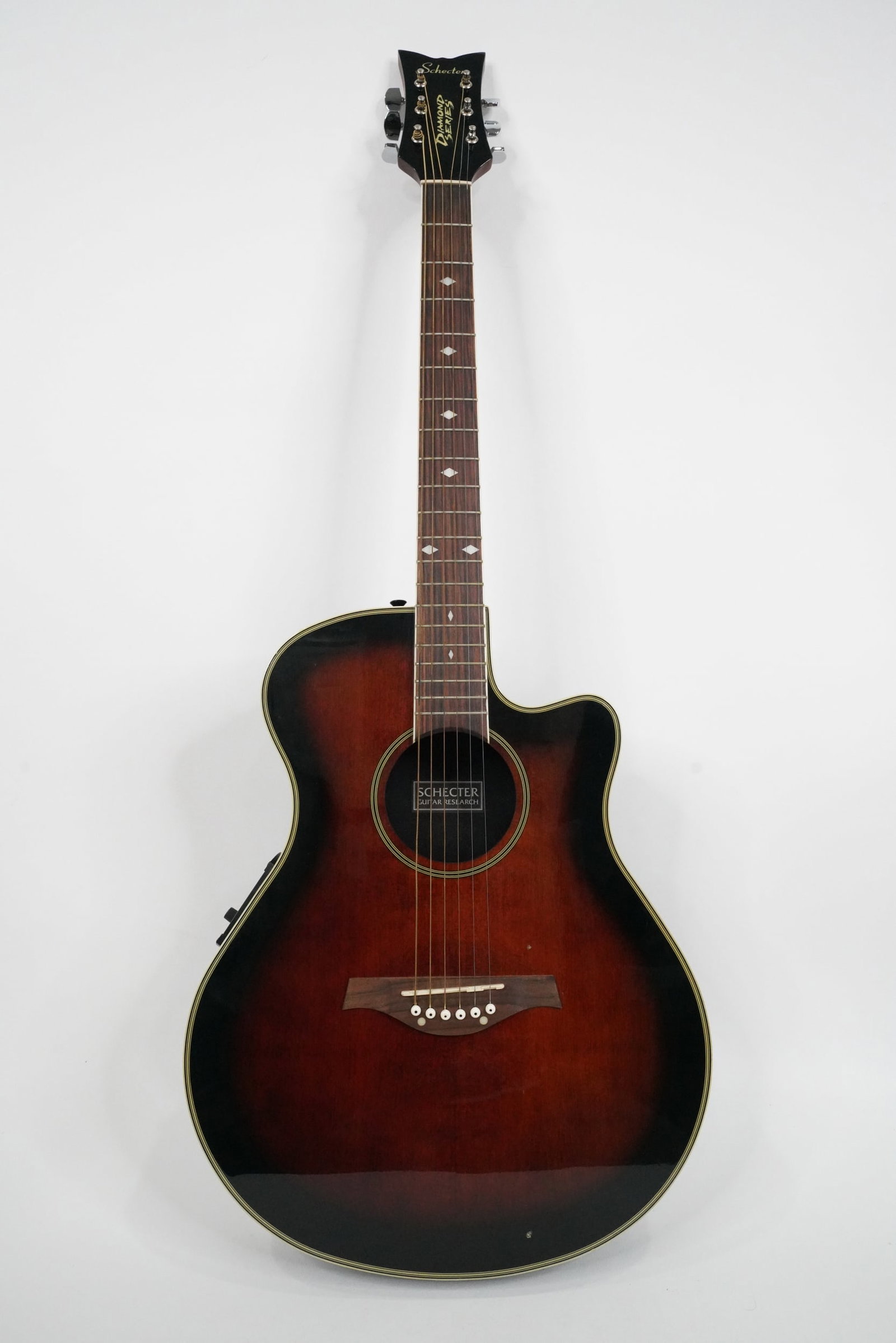 The Cure Robert Smith Prototype Schecter Guitar: The Cure Robert Smith Prototype Schecter Diamond Series Acoustic Electric Guitar and Case Obtained From Michael Aston Used in Studio W/Letter of Provenance - This Schecter Diamond Series acoustic elec