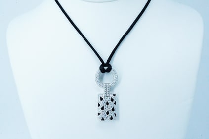 Cartier 2.85ctw Diamond, Onyx, 18K and Satin Necklace