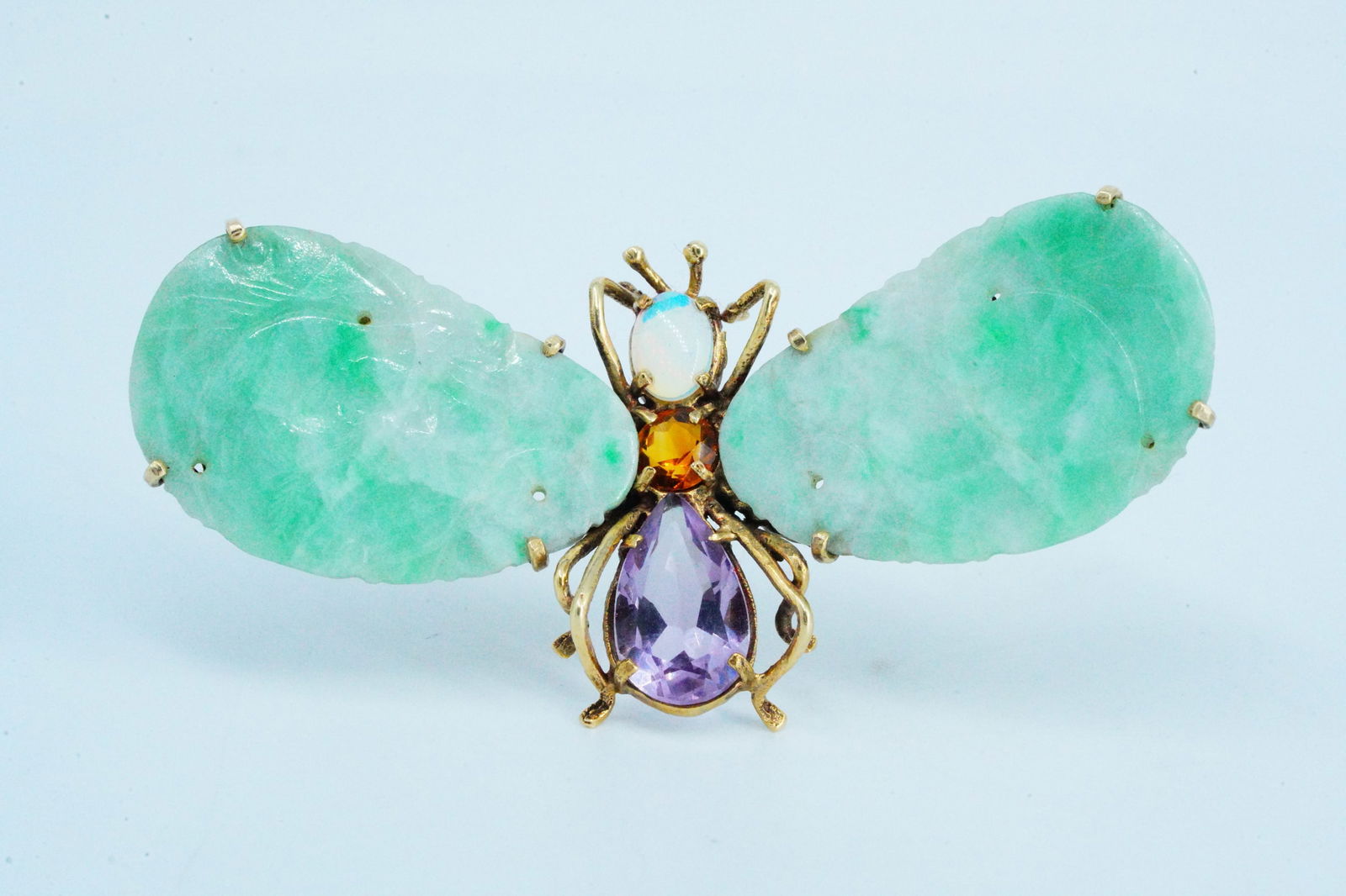 30mm Jade, 3.00ct Amethyst and 14K Dragonfly Brooch: 30mm Carved Green Jade, 3.00ct Amethyst and 14K Yellow Gold Dragonfly Brooch W/Opal and Citrine Accents - This exquisite piece is a fusion of timeless elegance and mystical allure, crafted to captivat