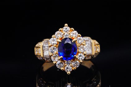 1.10ctw Diamond, 0.95ct Blue Sapphire and 18K Ring