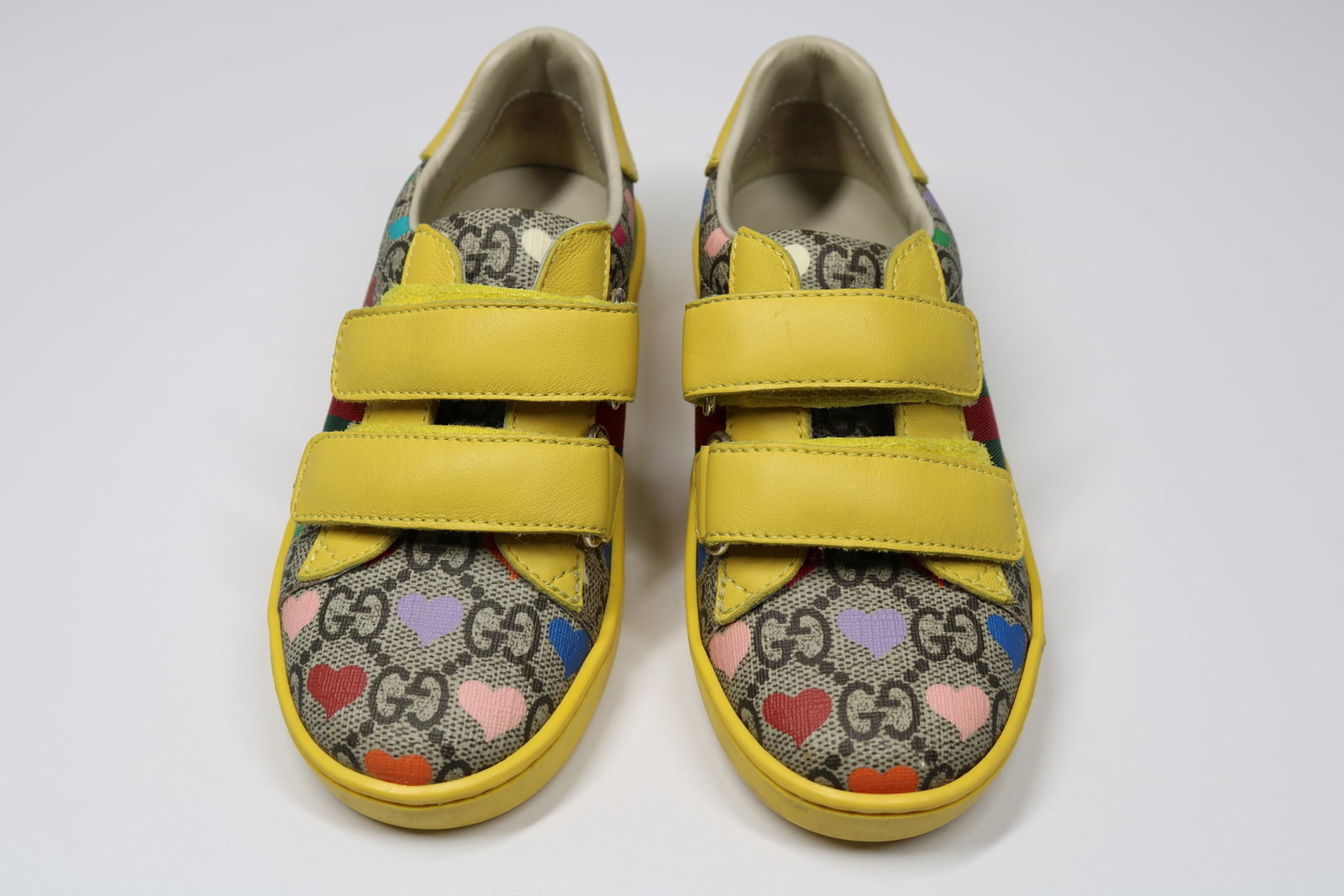 Gucci Children's Authentic Ace Supreme GG Sneakers: GUARANTEED AUTHENTIC. Gucci Children's Authentic Ace Supreme GG Sneakers with Heart Details - These Gucci children's Ace Supreme GG sneakers showcase a blend of sophistication and playful charm. Craft