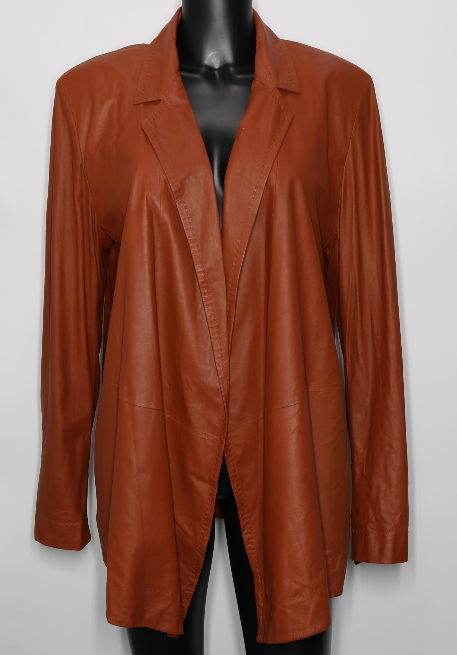 Escada Goat Leather Jacket, Brown/Brick: GUARANTEED AUTHENTIC. Escada Goat Leather Jacket, Brown/Brick - This lightweight, loose-fitting jacket is crafted with 100% goat leather in a stunning shade of brown/brick, a perfect pop to complement