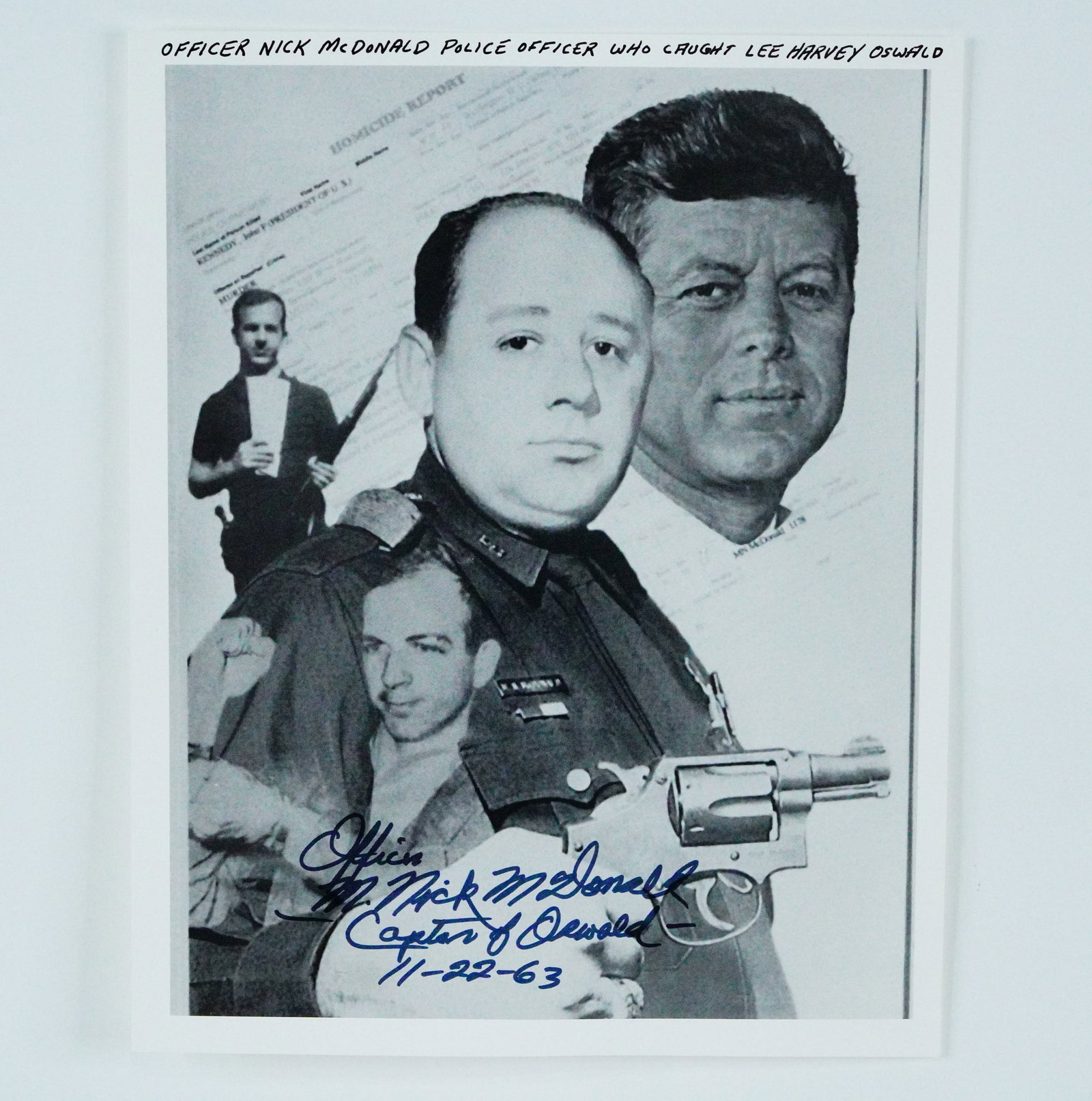 Signed Officer Nick McDonald Commemorative Photo: Signed Officer M. Nick McDonald Commemorative Photo - This commemorative photo depicting John F. Kennedy, Lee Harvey Oswald, and Officer M. Nick McDonald is signed by the officer who helped capture an