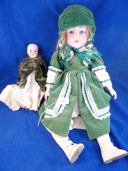(2) Antique Germany Bisque Head Dolls: These are Great Collectors Pieces. Both Dolls Are Marked Made In Germany. Their faces have very nice detail ears, lips, blush on cheeks. One of the Dolls has Some Repair Done on the Head, Other than T