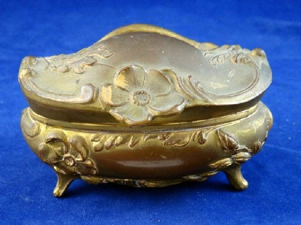 Antique Box W/Pink Cushioned Lining: This box has a finley detailed floral design. This is an ultra-rare find in this condition. There are signs of wear in the lining as it is extremely old. There is a maker's mark on the bottom B&W. Mea