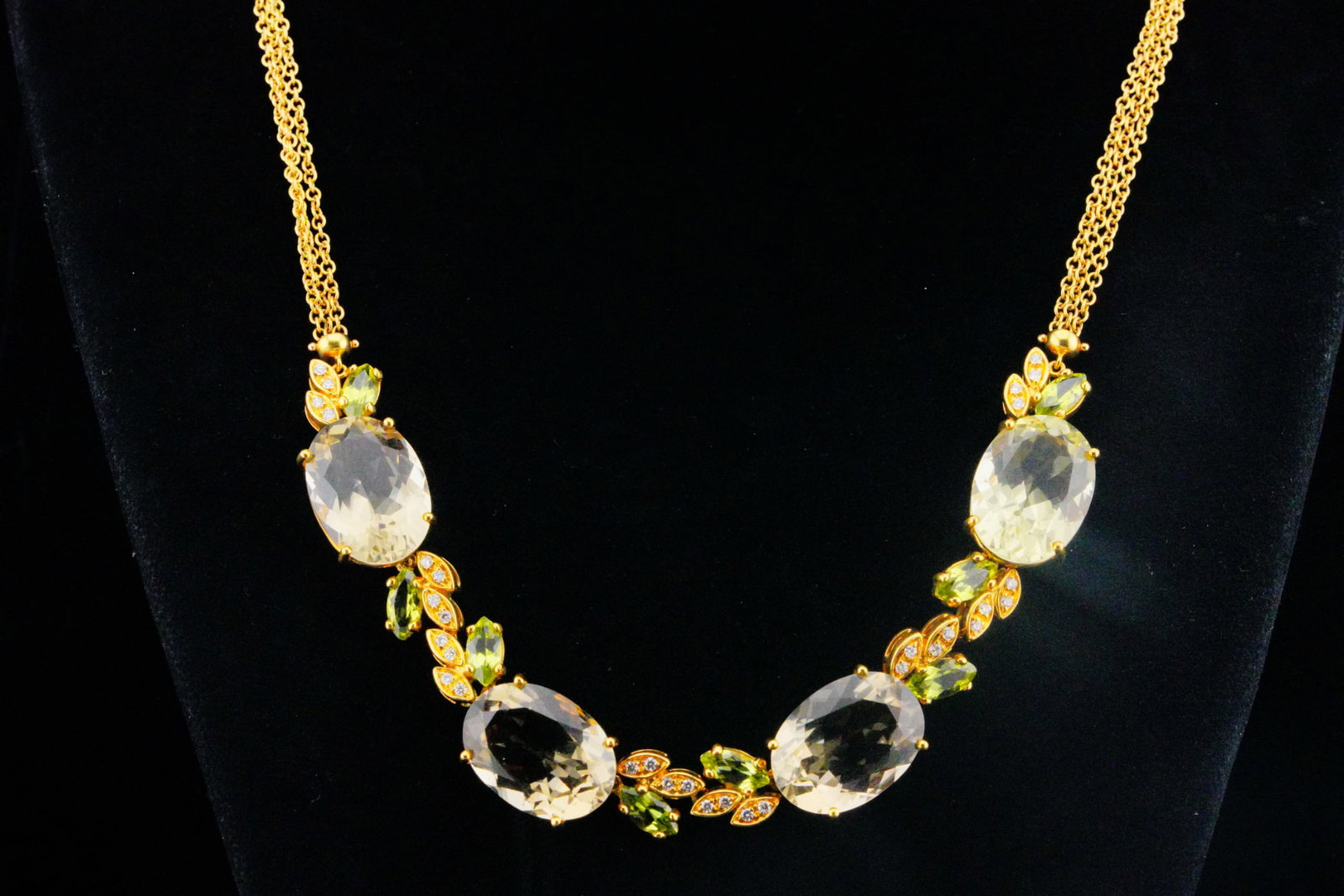 Bucherer Quartz, Peridot, Diamond and 18K Necklace: Bucherer 43.00ctw Smoky Quartz, 4.75ctw Peridot, 0.50ctw VS1-VS2/G-H Diamond and 18K Yellow Gold 18" Necklace - This magnificent Bucherer necklace is a striking masterpiece, combining bold gemstones w