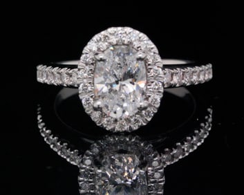 1.00ct Diamond in 0.25ctw Diamond 14K Halo Setting