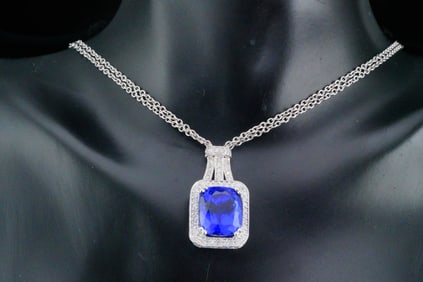 7.00ct Tanzanite, 1.00ctw Diamond and 14K Necklace