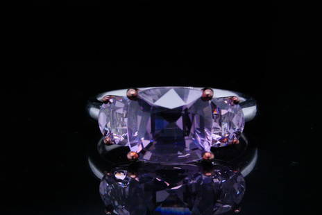 4.60ctw Purple Spinel and 18K White Gold Ring: 4.60ctw Purple Spinel and 18K White Gold Ring - This ring is crafted in 18k white gold and boasts approximately 4.60ctw purple spinel. Ring size: 6. Condition: Excellent; minimal signs of wear.