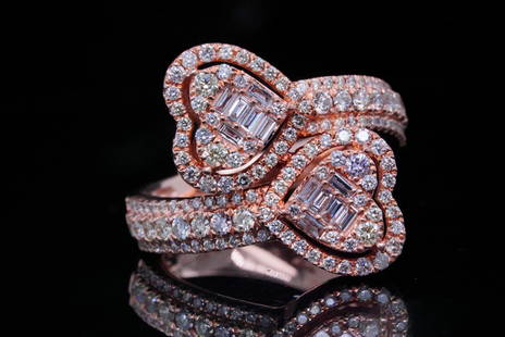 2.00ctw SI1-SI2/G-H Diamond and 14K Rose Gold Ring: 2.00ctw SI1-SI2/G-H Diamond and 14K Rose Gold Ring - This ring is crafted in 14k rose gold and has a bypass style design with a heart motif at each end. The ring is embellished with approximately