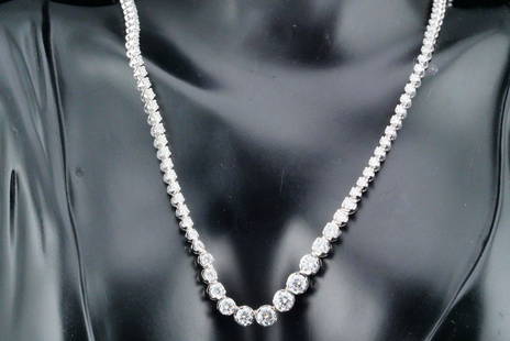 8.50ctw SI1-SI2/G-H Diamond and 18K Tennis Necklace: 8.50ctw SI1-SI2/G-H Diamond and 18K White Gold 17" Tennis Necklace - This beautiful tennis necklace is crafted in 18k white gold and is lined with approximately 8.50ctw SI1-SI2/G-H brilliant round cut