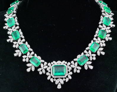 50.90ctw Emerald, 17.00ctw Diamond, 18K Necklace ($203,000 Appraisal): 50.90ctw Emerald, 17.00ctw VS1-VS2/G-H Diamond and 18K White Gold 17.5" Cocktail Necklace - THE LOT WILL INCLUDE A USPAP COMPLIANT APPRAISAL FOR $203,000. This exquisite cocktail necklace was finely c