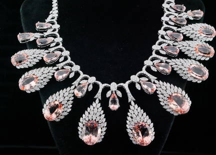 151.10ctw Morganite, 24.70ctw Diamond and 18K Necklace: 151.10ctw Morganite, 24.70ctw VS1-VS2/G-H Diamond and 18K White Gold 16.5" Cocktail Necklace - This stunning cocktail necklace is crafted in 18k white gold, and is embellished with approximately 151.1