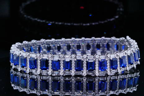 20.00ctw Blue Sapphire, 3.75ctw Diamond, 18K Bracelet: 20.00ctw Blue Sapphire, 3.75ctw VS2-SI1/G-H Diamond and 18K White Gold 7" Bracelet - This exquisite bracelet was finely crafted in 18k white gold and is lined with approximately 20.00ctw emerald cut b