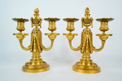 Pair of Vintage French Empire-Style Bronze Candelabra: Pair of Vintage French Empire-Style Gilt Bronze Candelabra - This is an elegant pair of vintage French Empire-style gilt bronze candelabra. Each piece features a classical urn-shaped central column to