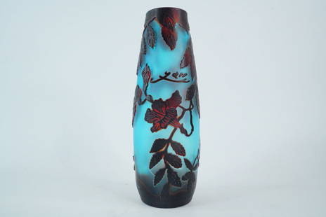 Cameo Glass Bud Vase with Leaf and Blossom Design: Cameo Glass Bud Vase with Leaf and Blossom Design - A striking Art Nouveau-style cameo glass vase, showcasing a layered blue ground overlaid with deep burgundy and amber glass in a richly carved flora