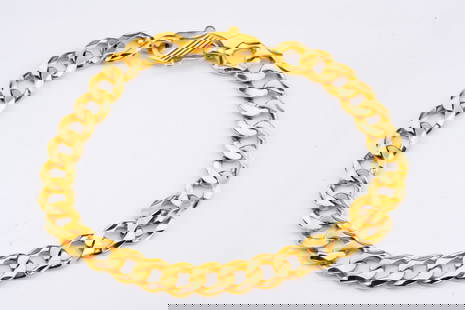 22K Yellow Gold Curb Chain Bracelet: 22K Yellow Gold Curb Chain Bracelet - This bracelet is crafted in 22k yellow gold and has a curb chain design. The bracelet has a luxurious satin finish, giving the piece a sophisticated look. This pi