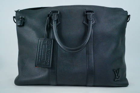 Louis Vuitton Black Leather Messenger Bag: Louis Vuitton Black Leather Messenger Bag - This Louis Vuitton messenger bag is crafted in black leather and features two top handles and matching black hardware. The top zipper opens to a large black