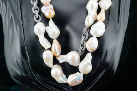 17mm-42mm Baroque Pearl and White Sapphire Necklace: 17mm-42mm Baroque Pearl, 2.50ctw White Sapphire and Silver 36" Necklace - This necklace is comprised of 17mm-42mm iridescent baroque pearls with black rhodium plated silver clasp and chain inserts. Th