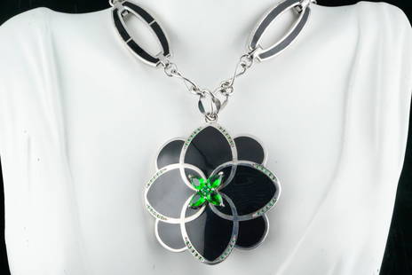 Cristina Sabatini Resin, Crystal, Rhodium Plated Necklace: Cristina Sabatini Black Italian Resin, Green Crystal and Rhodium Plated Peonia Necklace - Striking and sculptural, this Cristina Sabatini designer necklace showcases a bold floral motif crafted from h