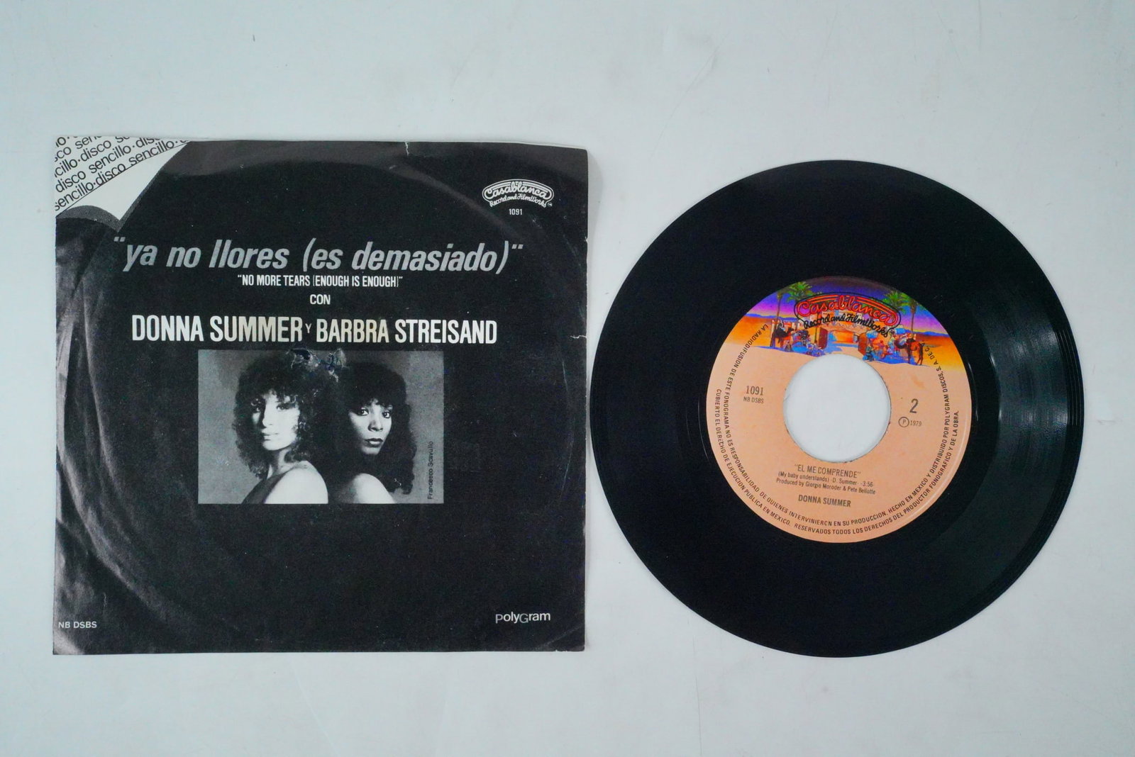 Rare Intl Mexico Spanish No More Tears 45 Vinyl: Rare Intl Mexico Spanish No More Tears 45 Vinyl - This lot features a rare international Spanish-language, Mexico-exclusive release of Barbra Streisand's 1979 collaboration with Donna Summer, "No More