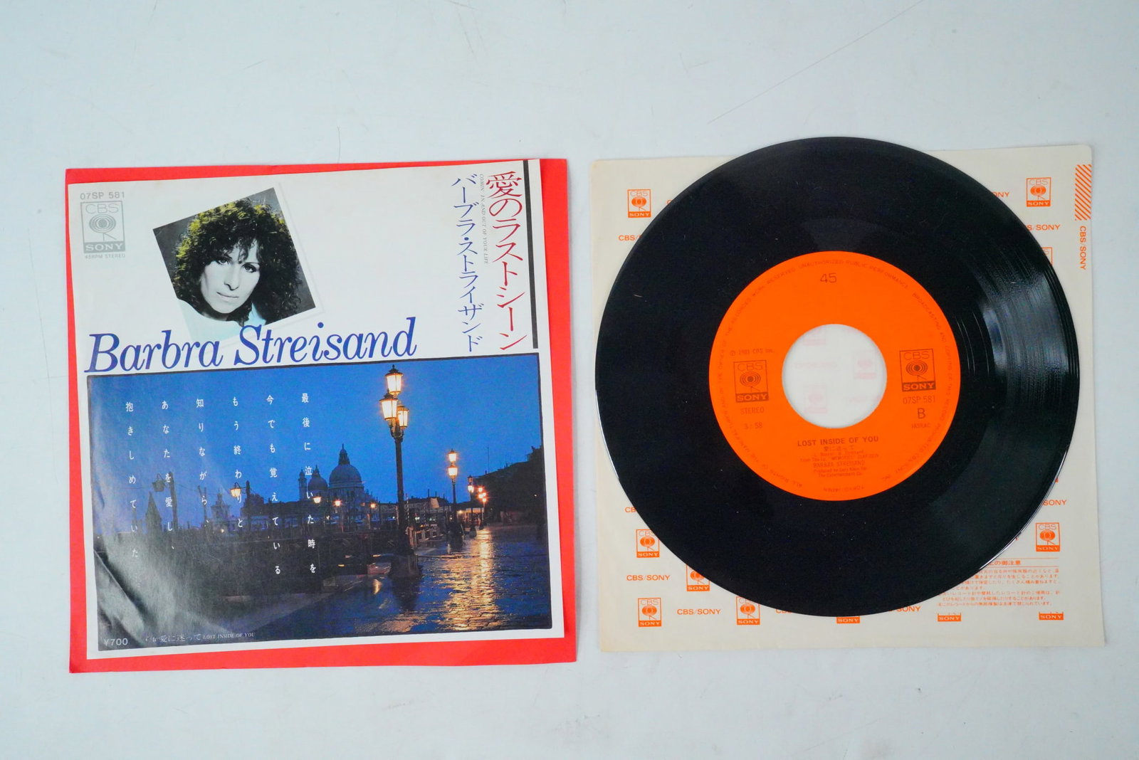 Rare Intl Japan Comin In And Out...45 Vinyl: Rare Intl Japan Comin In And Out...45 Vinyl - This lot features a rare international Japan-exclusive release of Barbra Streisand's 1981 single "Comin' In And Out Of Your Life", from the compilation al