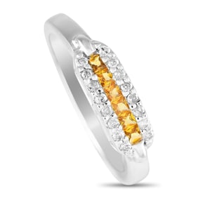 14K, 0.15ctw Diamond and 0.15ctw Yellow Sapphire Ring