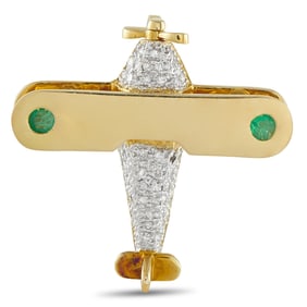 18K, 0.25ctw Diamond and Emerald Airplane Brooch