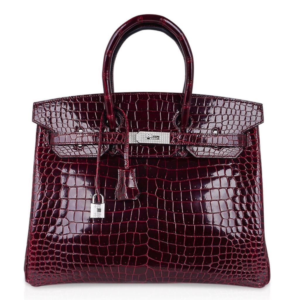 Hermes Birkin 35 Bordeaux Crocodile 10.23ctw Diamond 18K Gold: Hermes Shiny Bordeaux Porosus Crocodile, 10.23ctw Diamond and 18K White Gold Birkin 35 - Guaranteed Authentic - This exceptional handbag from Hermes is the tour de force of the house, and is an incred