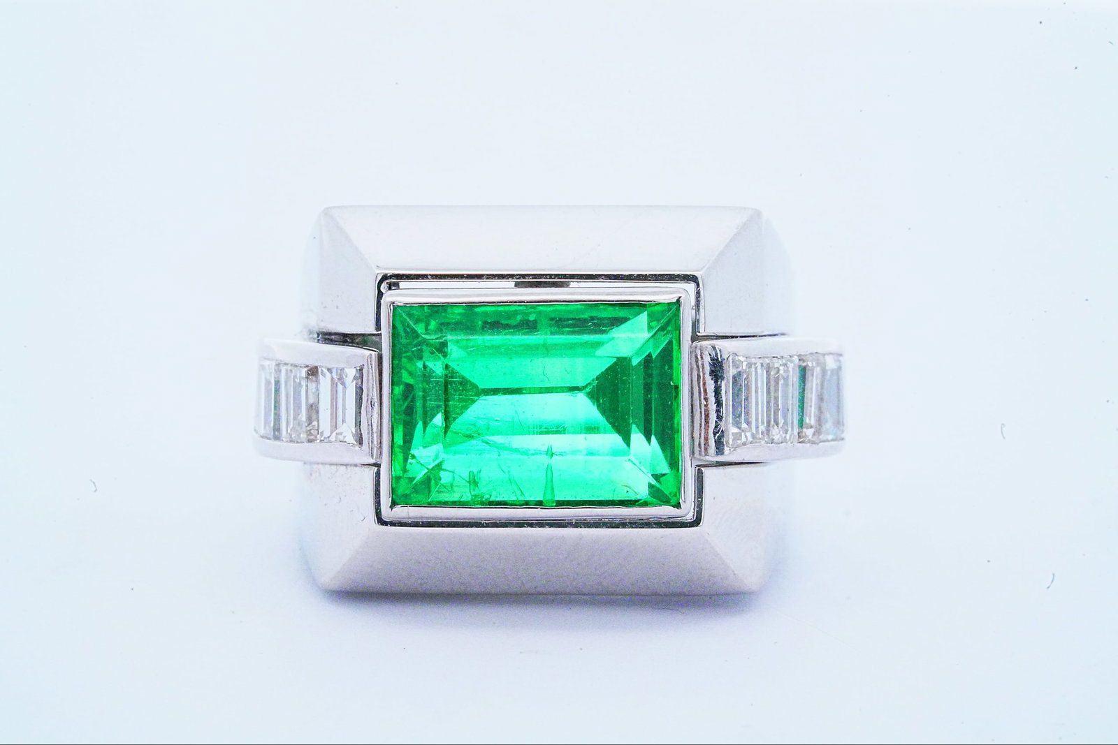 David Webb 3.90ct Colombian Emerald, Diamond, Plat/18K Ring: David Webb 3.90ct AGL Certified Colombian Emerald, 2.00ctw VS1/D-E Diamond, and Platinum/18K White Gold Ring - INCLUDES $129,000 APPRAISAL REPORT. A bold and architectural creation from famed American