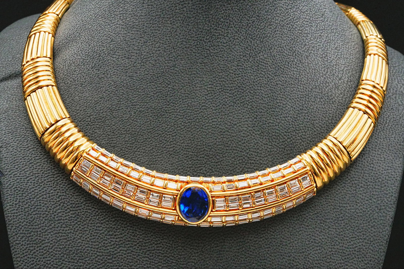 10.60ctw Diamond, 8ct No-Heat Ceylon Sapphire, 18K Necklace: 10.60ctw VS1-VS2/E-F Diamond, 8.00ct AGL Certified No-Heat Ceylon Sapphire and 18K Yellow Gold Collar Necklace - INCLUDES $157,500 APPRAISAL REPORT. A magnificent collar necklace showcasing an excepti