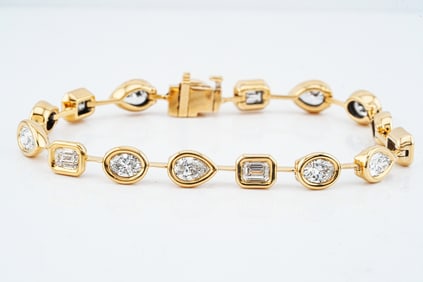 6.40ctw GIA VVS2-SI2/E-G Diamond and 18K Bracelet