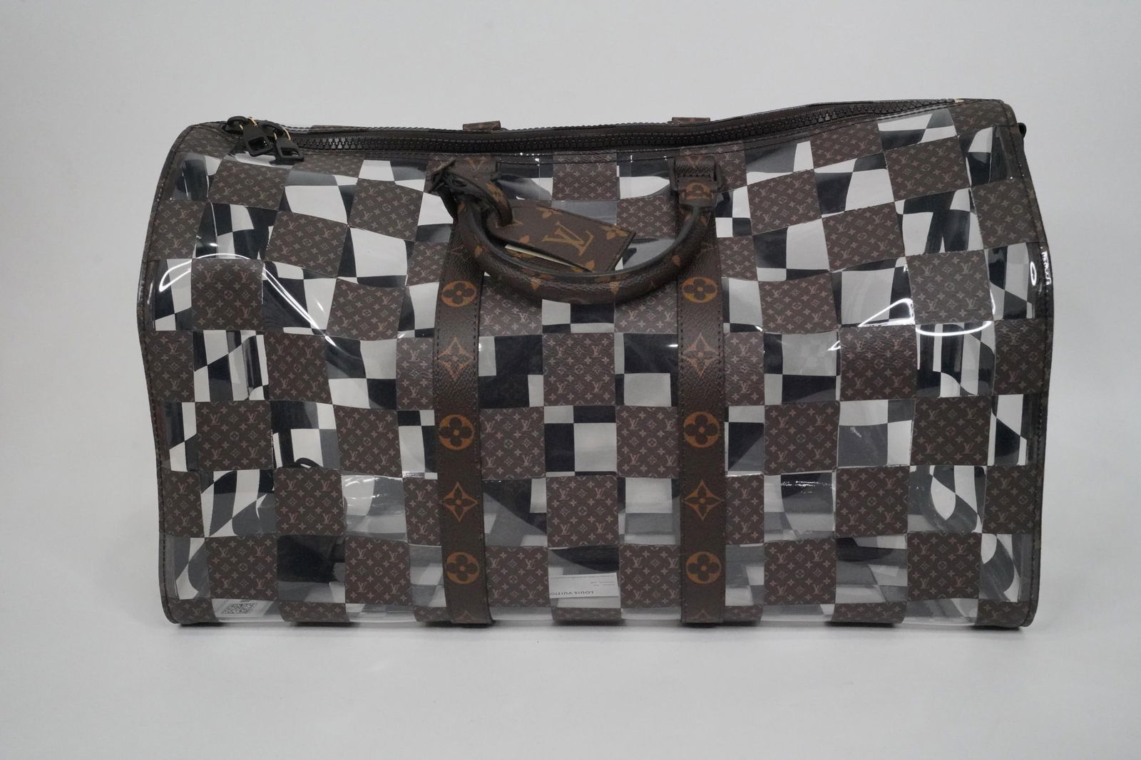 Louis Vuitton FW 2022 Monogram Chess Keepall 50: Louis Vuitton FW 2022 Monogram Chess Keepall Bandouliere 50 (Virgil Abloh Final Collection) Never Used W/Dust Cover - GUARANTEED AUTHENTIC. This Keepall Bandouliere 50 duffel from Louis Vuitton comes