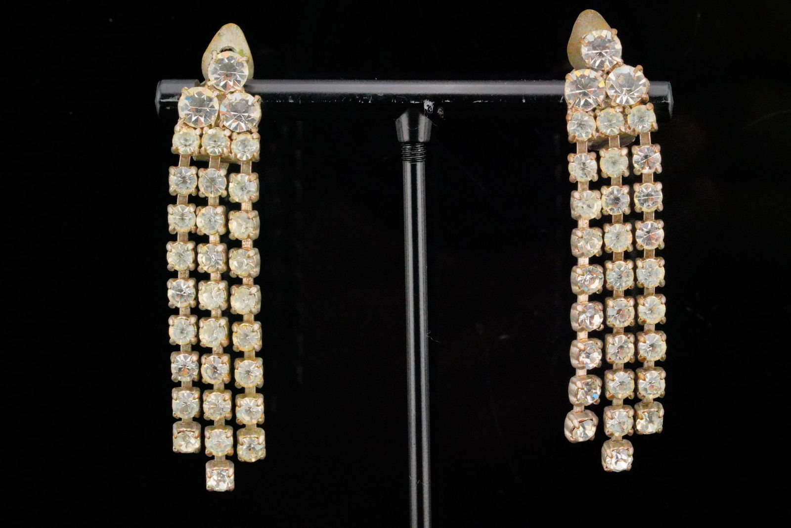 Marilyn Monroe Personally Owned Rhinestone Ear Clips: Marilyn Monroe Personally Owned Rhinestone Clip-On Earrings Acquired From Inez Melson W/Letter of Provenance - Presented here is a striking pair of rhinestone clip-on earrings personally owned by Mari