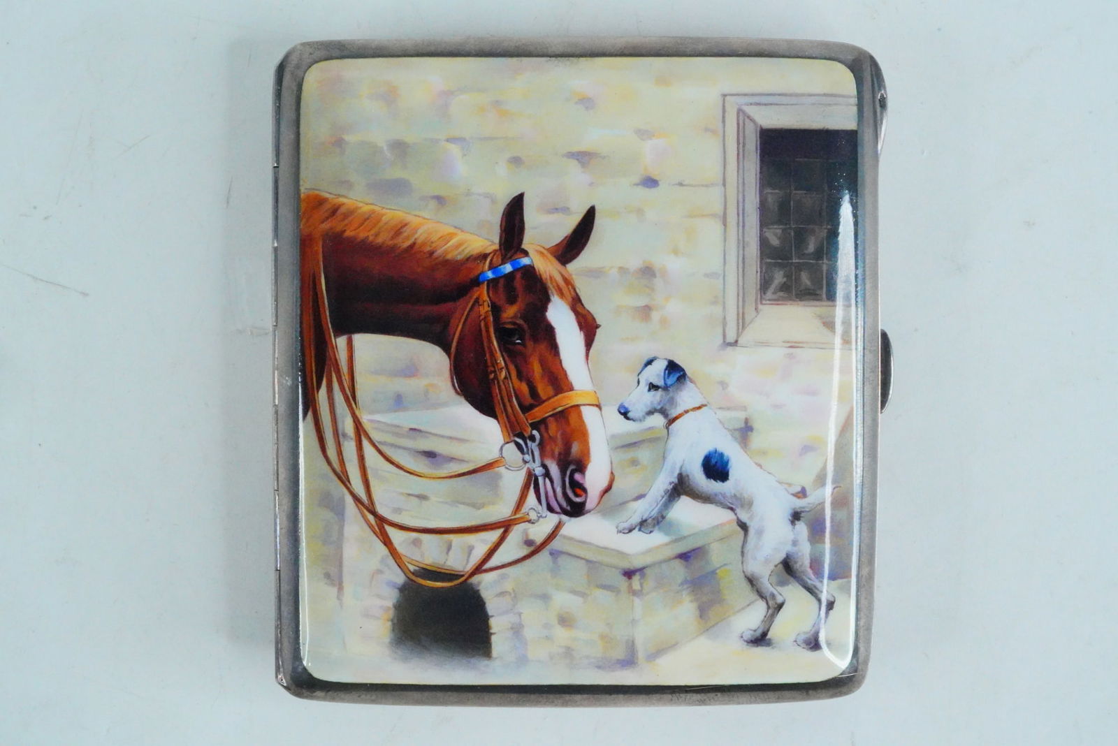 German Antique Enameled 800 Silver Cigarette Case: German Antique Enameled 800 Silver Cigarette Case, Dated 1915 - An elegant early 20th-century German silver cigarette case, the cover decorated with a fine enamel scene of a bridled chestnut horse gre