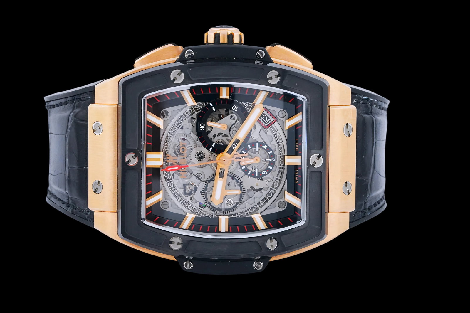 Hublot Spirit of Big Bang 18K Rose Gold 641.OM.0183.LR: The Spirit of Big Bang reference 601.OM.0183.LRis crafted in 18K Rose Gold, paired with a black ceramic bezel secured by Hublots signature H-shaped screws. The openworked skeleton dial reveals the aut