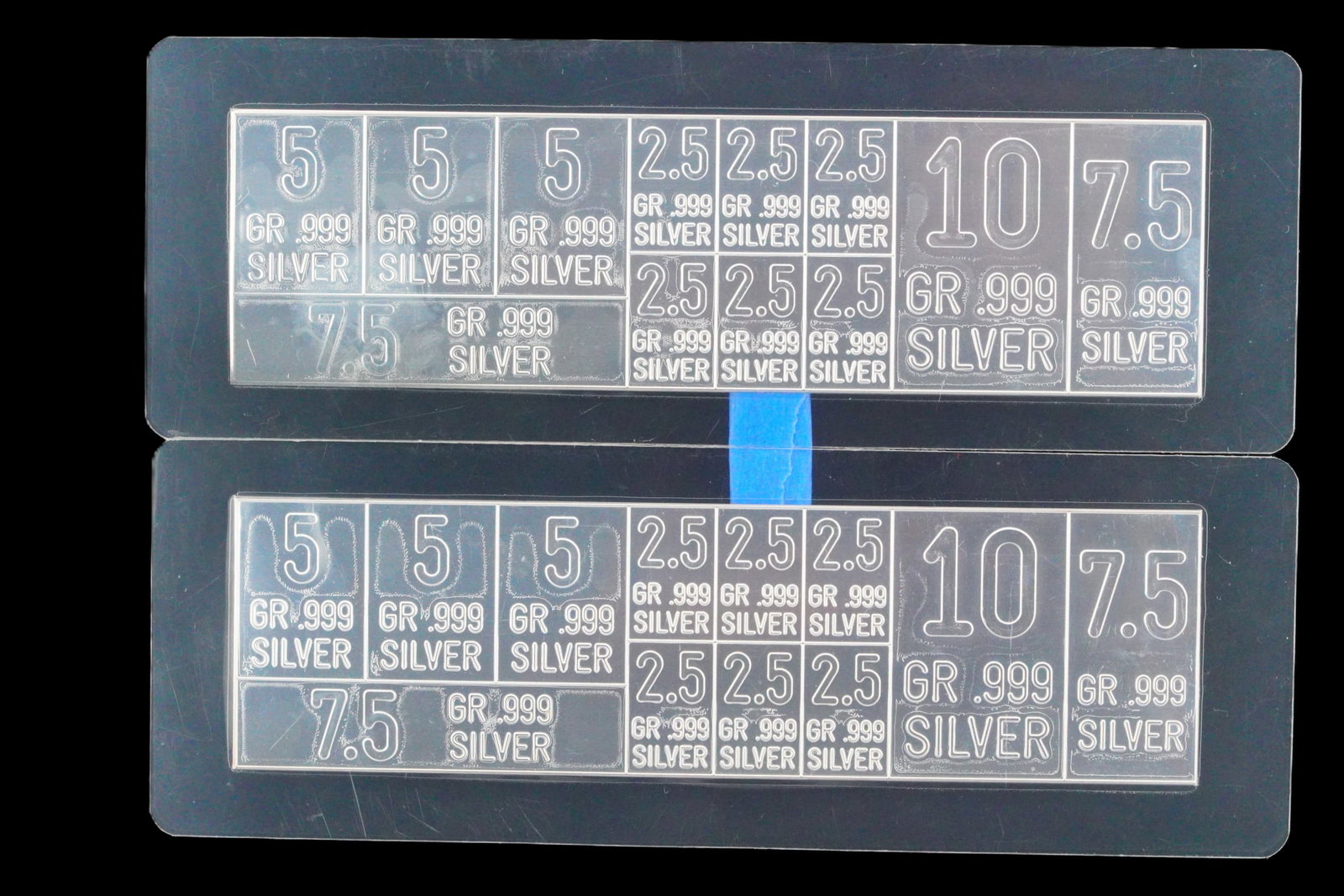 Lot of (2) Fractional .999 Fine Silver Grain Sheets: Lot of (2) Fractional .999 Fine Silver Grain Sheets, 110 Grains Total - This lot consists of two fractional silver grain sheets, each composed of individually stamped breakable bars in .999 fine silve