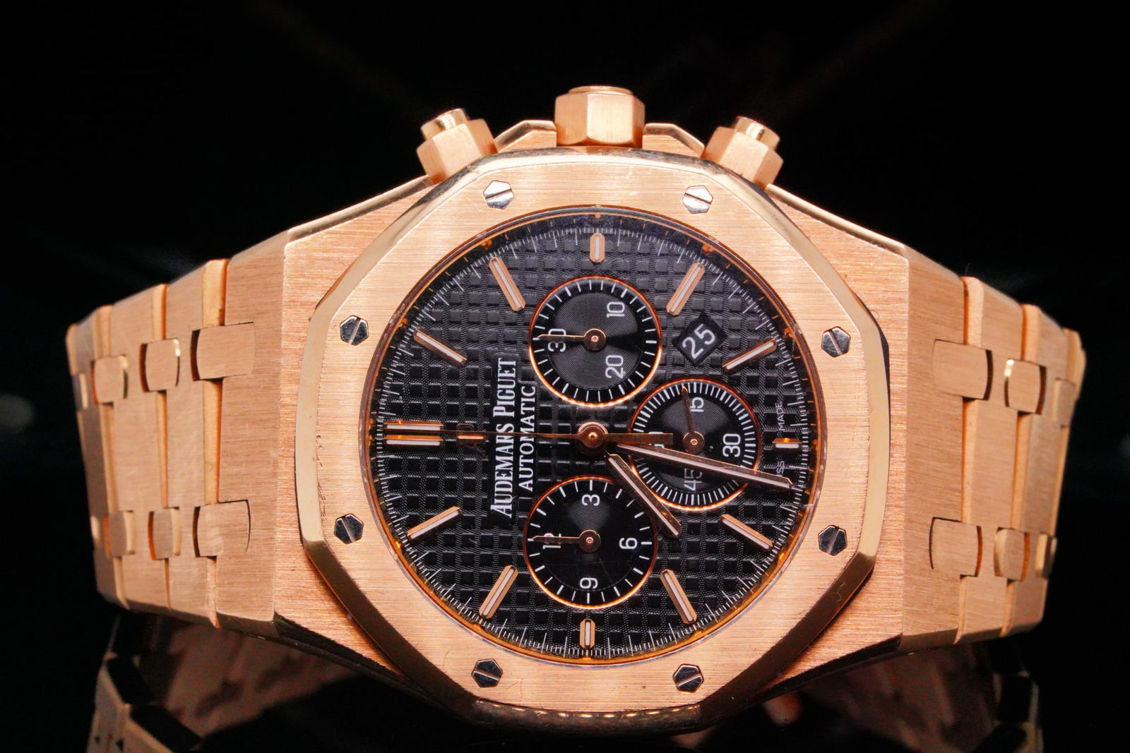 Audemars Piguet Royal Oak Chronograph 41mm 18K Watch: Audemars Piguet Royal Oak Chronograph 41mm 18K Rose Gold Automatic Watch - This iconic Audemars Piguet Royal Oak Chronograph is crafted entirely in solid 18K rose gold and features the instantly recog