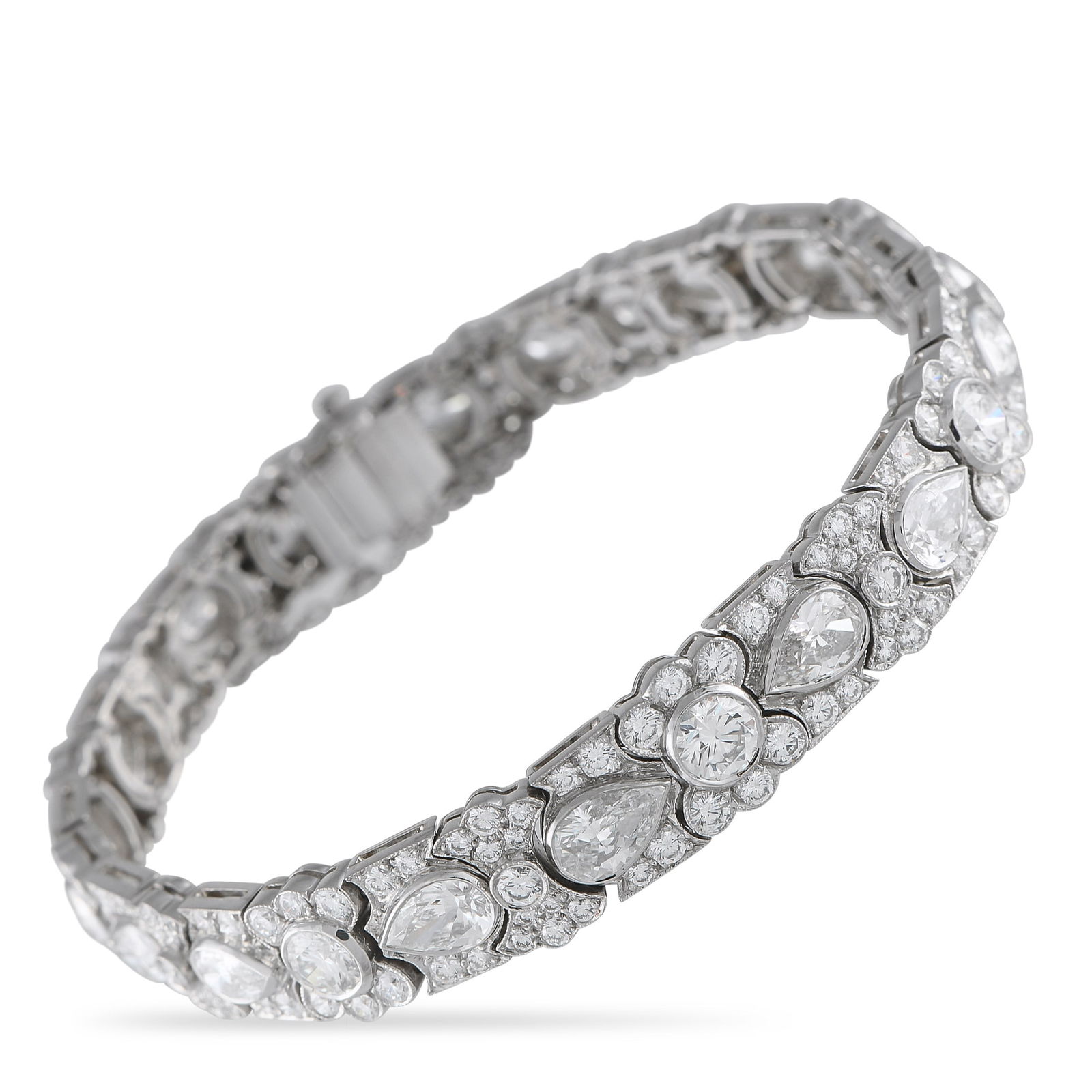 Tiffany & Co. 19.50ctw Diamond and Platinum Bracelet: Tiffany & Co. Antique 19.50ctw Diamond and Platinum Art Deco Bracelet - This antique bracelet from Tiffany & Co. showcases the bold geometry and refined elegance of the Art Deco era. It is crafted in