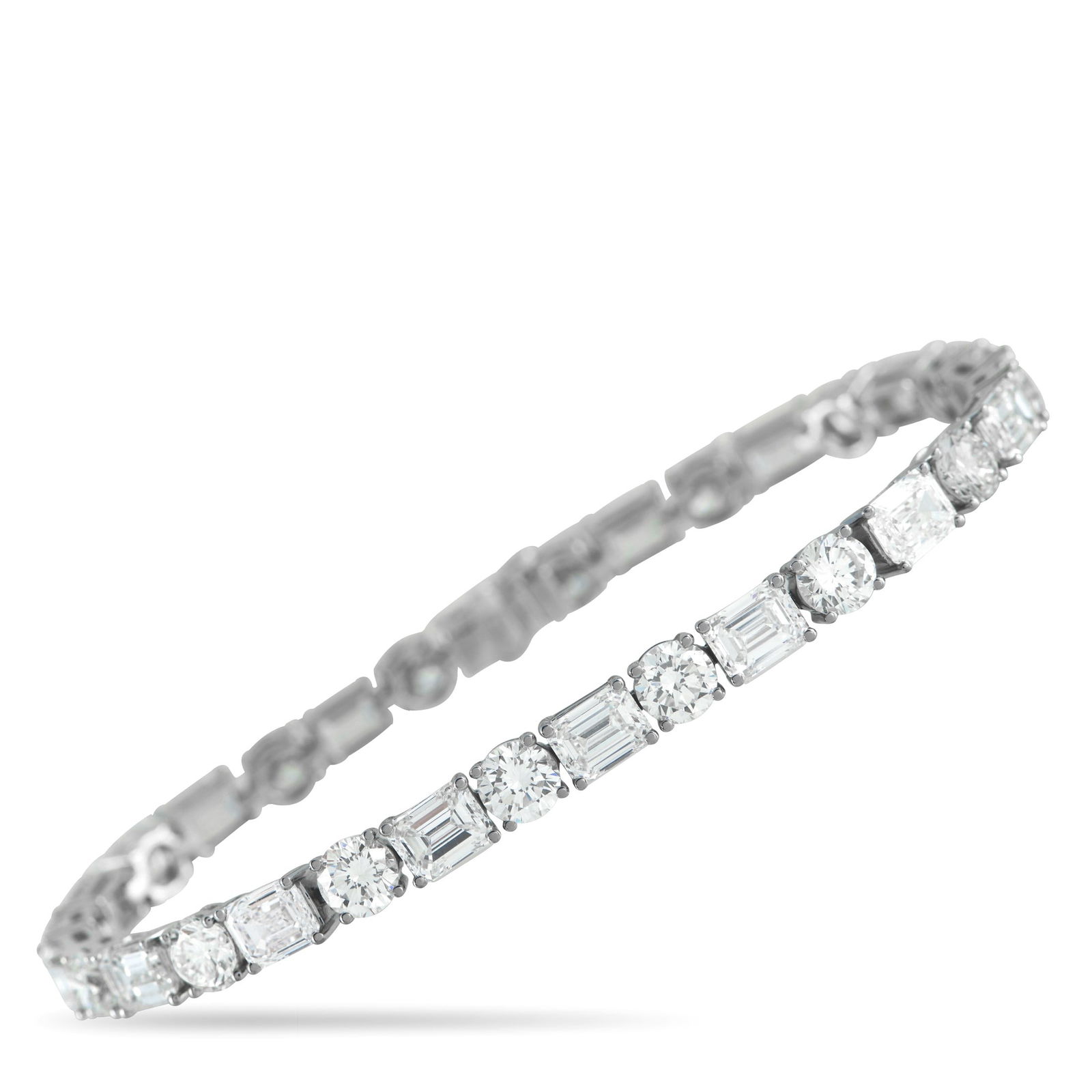 19.85ctw Diamond and 18K White Gold 7" Bracelet: 19.85ctw Diamond and 18K White Gold 7" Bracelet - This luxurious bracelet offers a classic and sophisticated look suitable for any occasion. Alternating round-cut diamonds totaling approximately 8.10