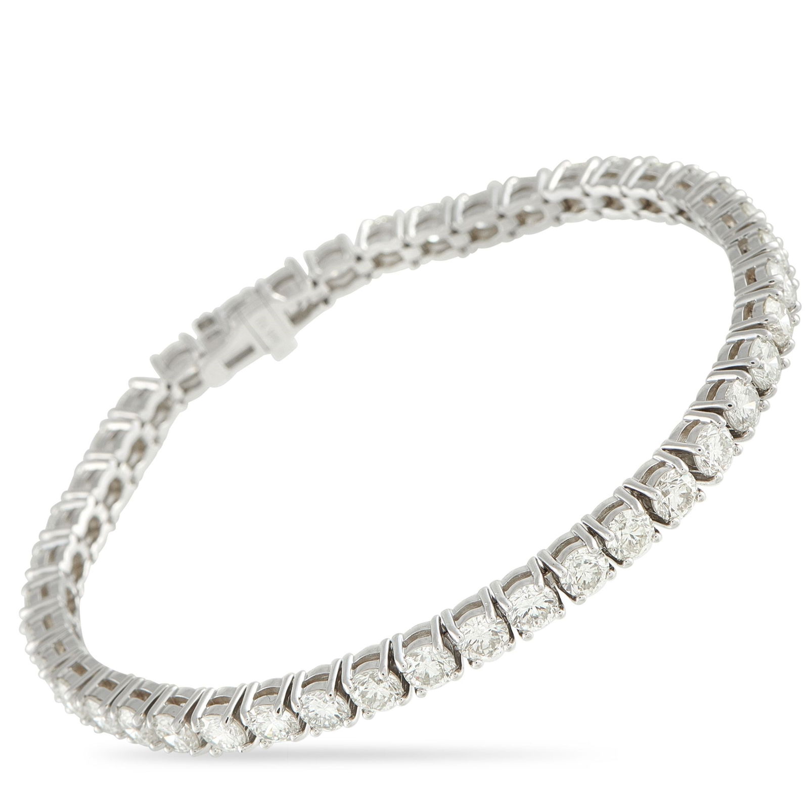 10.50ctw Diamond and 14K White Gold Tennis Bracelet: 10.50ctw SI1-SI2/H-I Diamond and 14K White Gold 7.25" Tennis Bracelet - This 14K white gold tennis bracelet features an impressive 10.5 carats of diamonds, each selected for consistent fire, clarity,