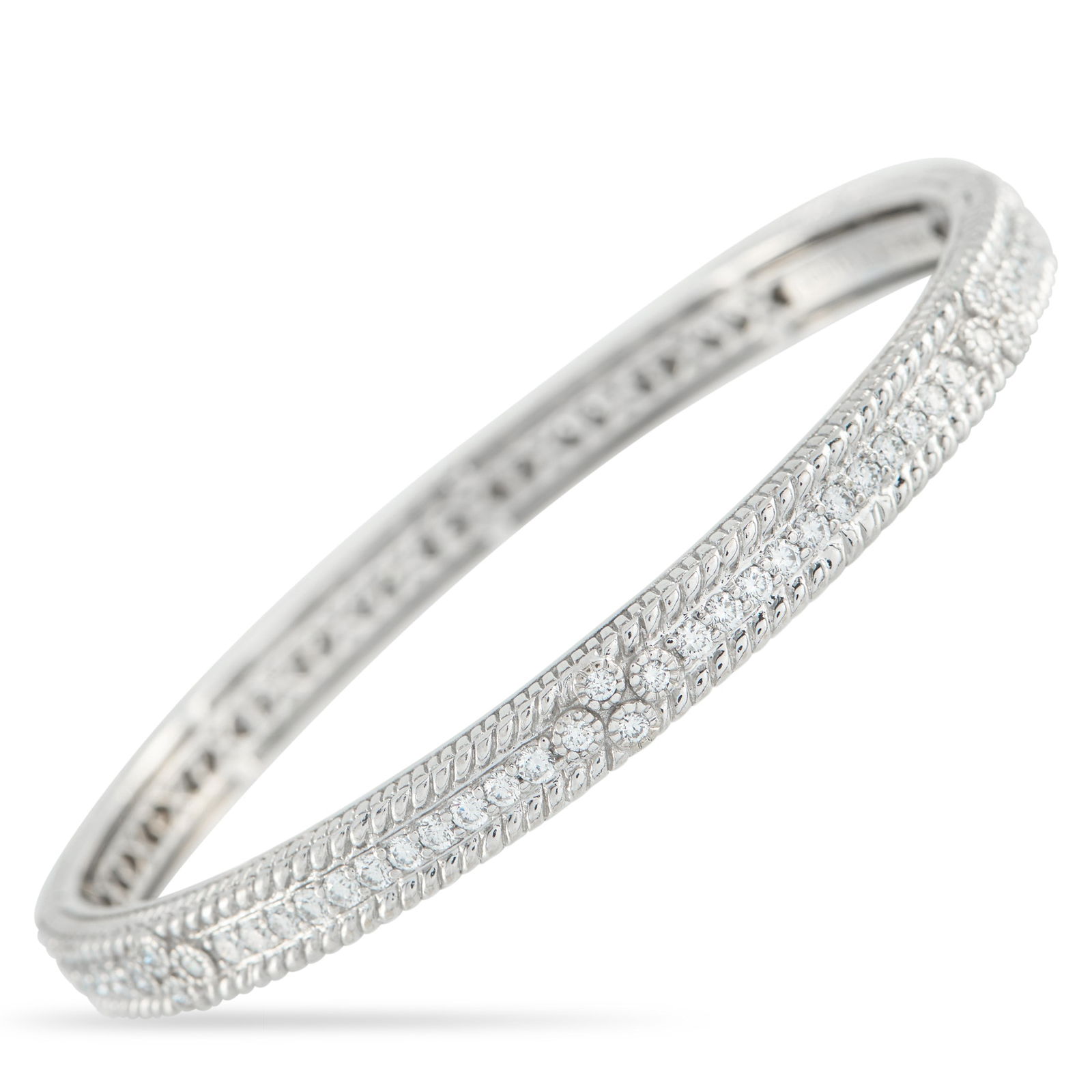 Judith Ripka 1.25ctw VS/G-H Diamond and 18K Bangle: Judith Ripka 1.25ctw VS/G-H Diamond and 18K White Gold 7" Bangle - Refined and timeless, this elegant bangle by Judith Ripka adds effortless sophistication to any ensemble. The richly textured 18K whi