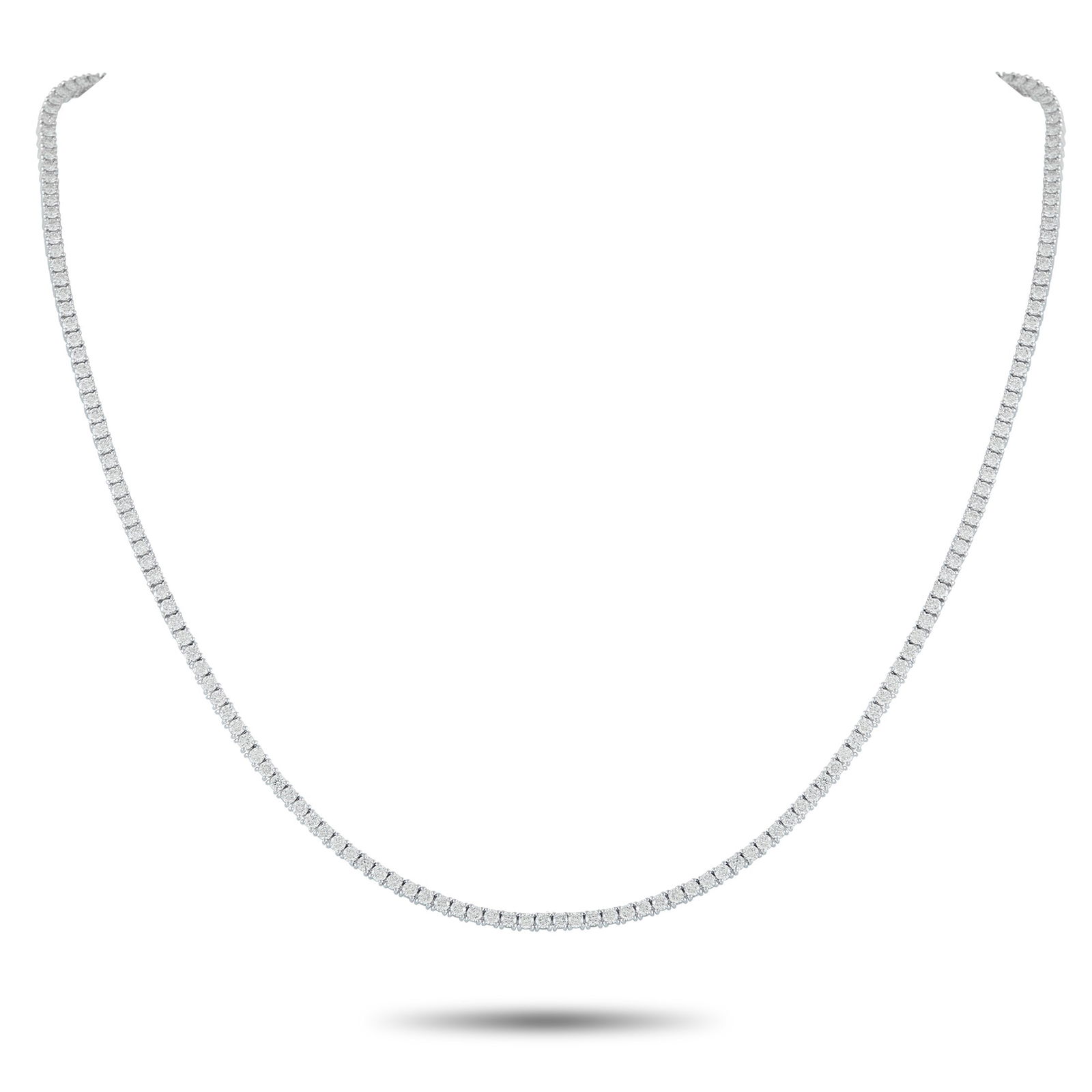 5.75ctw Diamond and 18K White Gold Tennis Necklace: 5.75ctw Diamond and 18K White Gold 17.25" Tennis Necklace - Sleek and timeless in design, this sophisticated tennis necklace offers effortless elegance that never goes out of style. Crafted in polishe