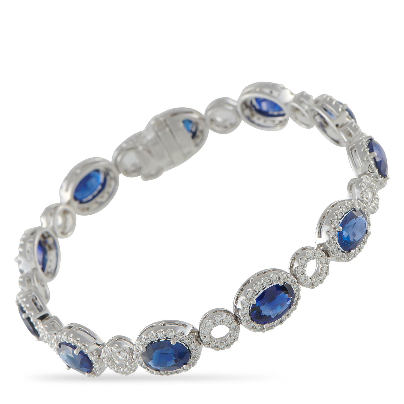 8.50ctw Blue Sapphire, 2.50ctw Diamond, 18K Bracelet: 8.50ctw Blue Sapphire, 2.50ctw Diamond and 18K White Gold 6.75" Bracelet - This elegant luxury bracelet adds a striking pop of color and refined brilliance to any ensemble. Crafted in solid 18K white