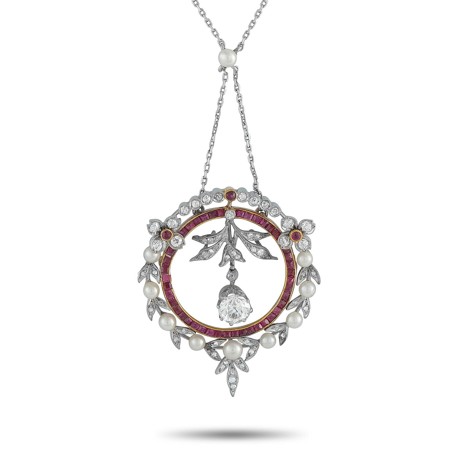 1.95ctw Diamond, Ruby, Platinum and 18K 16" Necklace: 1.95ctw Diamond, Ruby, Platinum and 18K Yellow Gold 16" Pendant Necklace - This exceptional luxury necklace is rich with intricate detail and refined craftsmanship. At the center of the circular penda