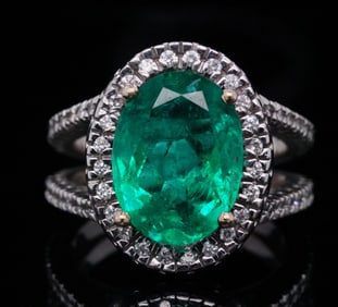 4.50ct Emerald, 0.45ctw Diamond and 14K White Gold Ring