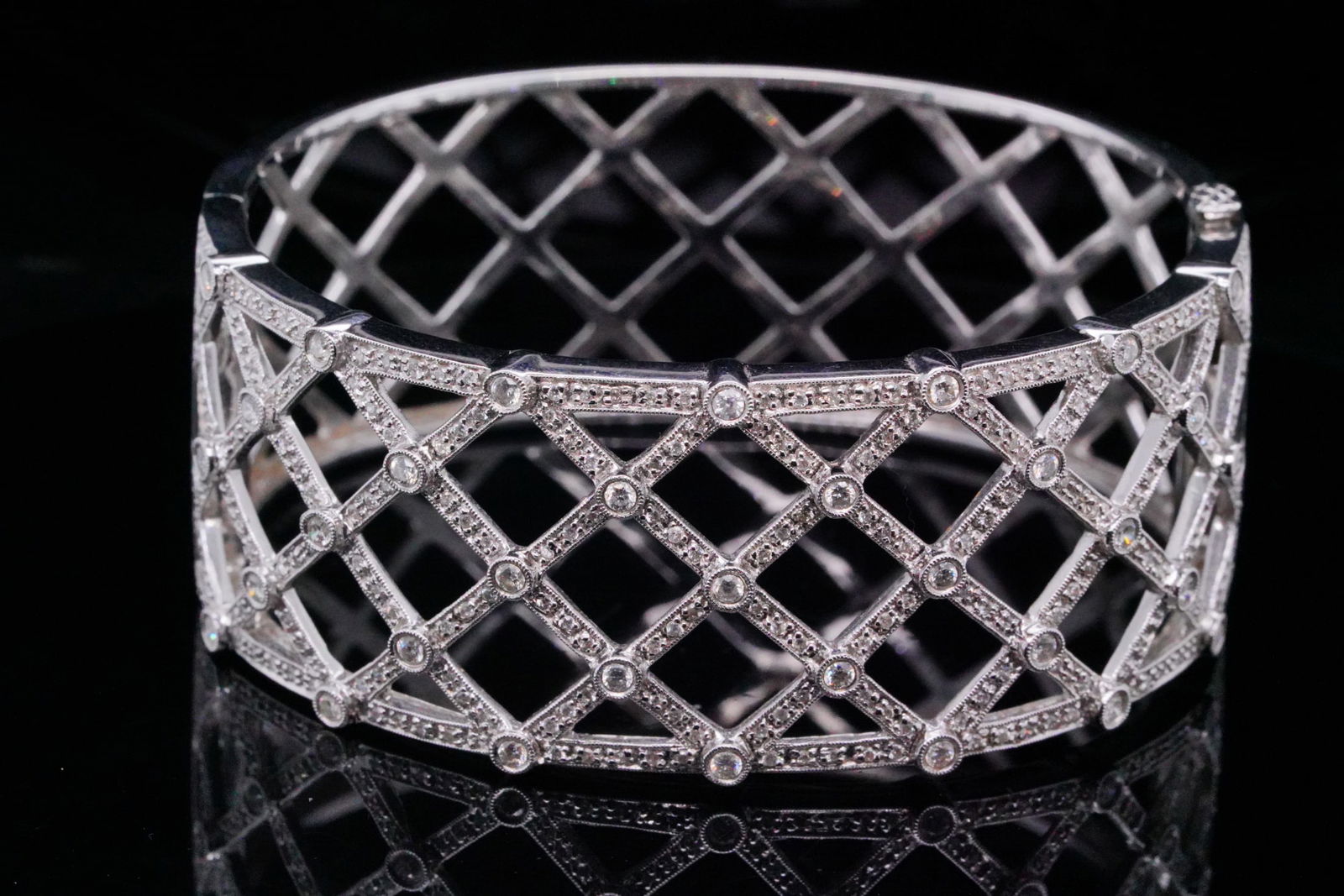 2.50ctw SI1-SI2/G-H Diamond and 14K White Gold Bracelet: 2.50ctw SI1-SI2/G-H Diamond and 14K White Gold 1" Wide Bangle Bracelet - This striking diamond bangle bracelet is crafted in solid 14K white gold and features an elegant openwork lattice design that w