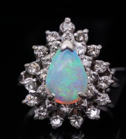11mm Opal, 1.35ctw SI1-SI2/H-J Diamond and 14K Ring